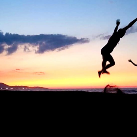 jumping happy beach balkan