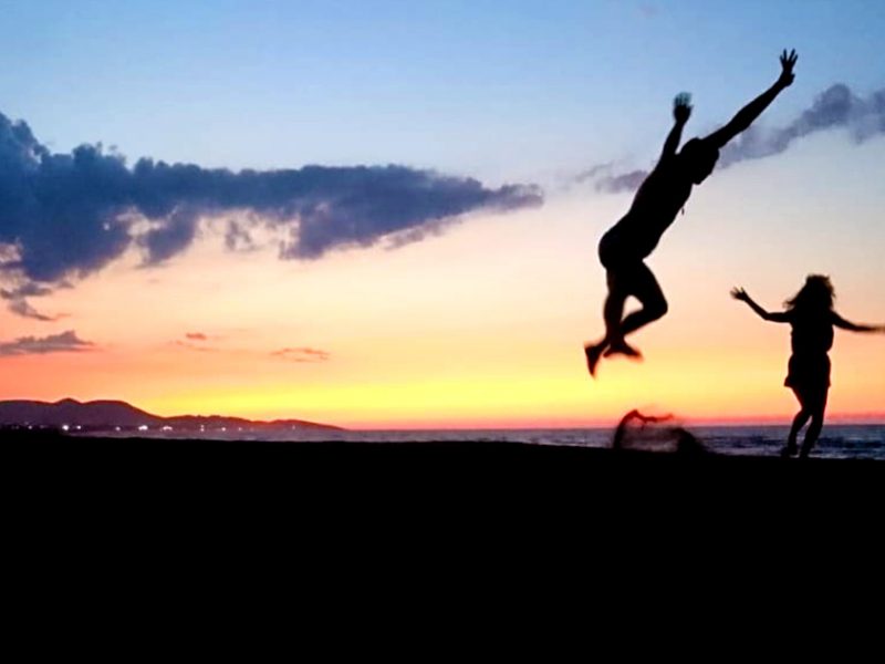 jumping happy beach balkan